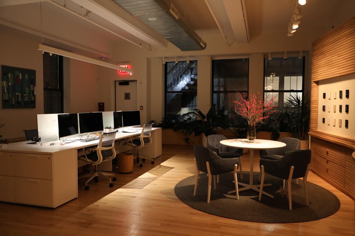 white keypad on white brick wall lutron