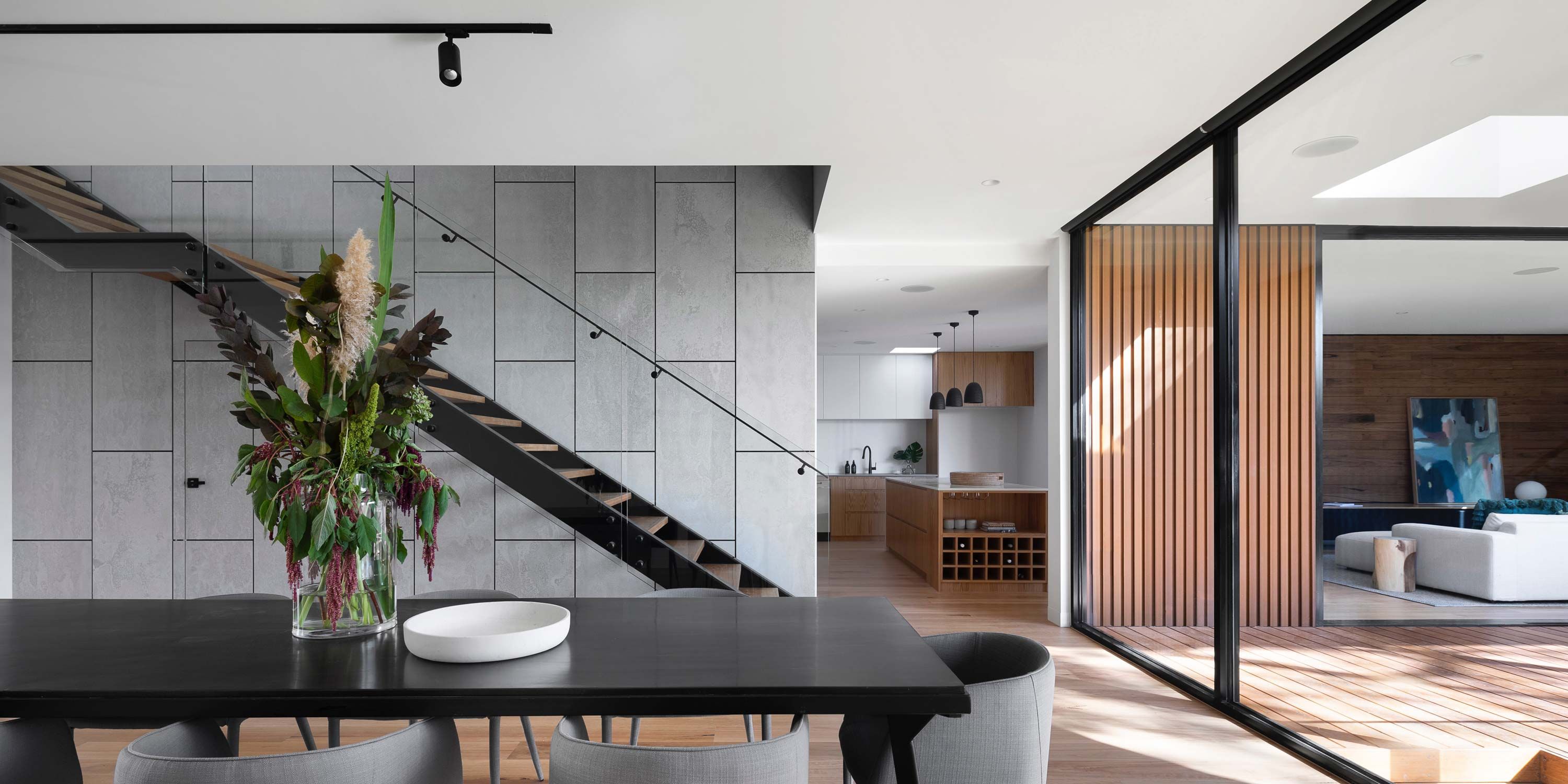 modern home with wooden and black accents