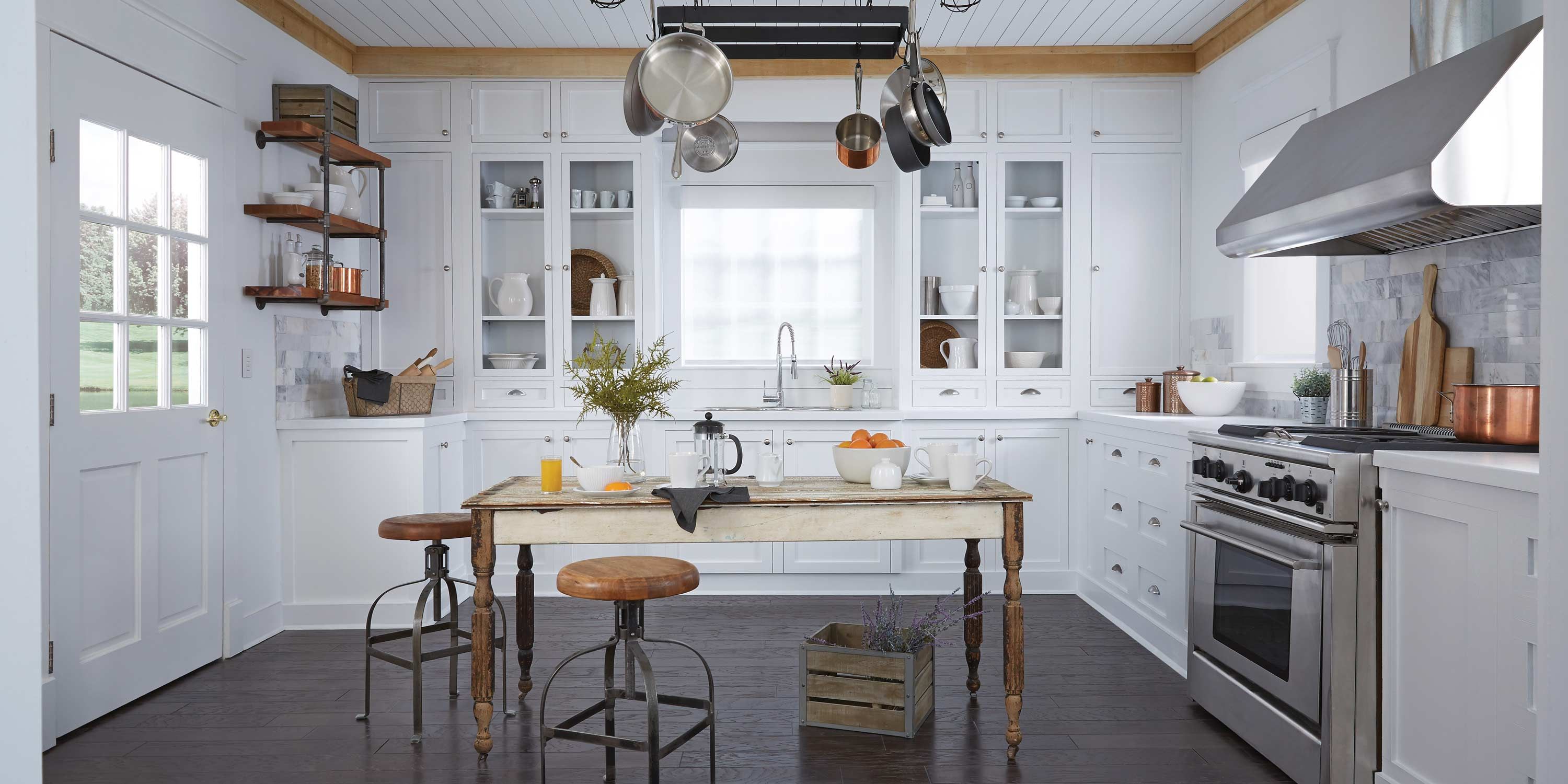 cool toned kitchen with lutron technology shading and lighting