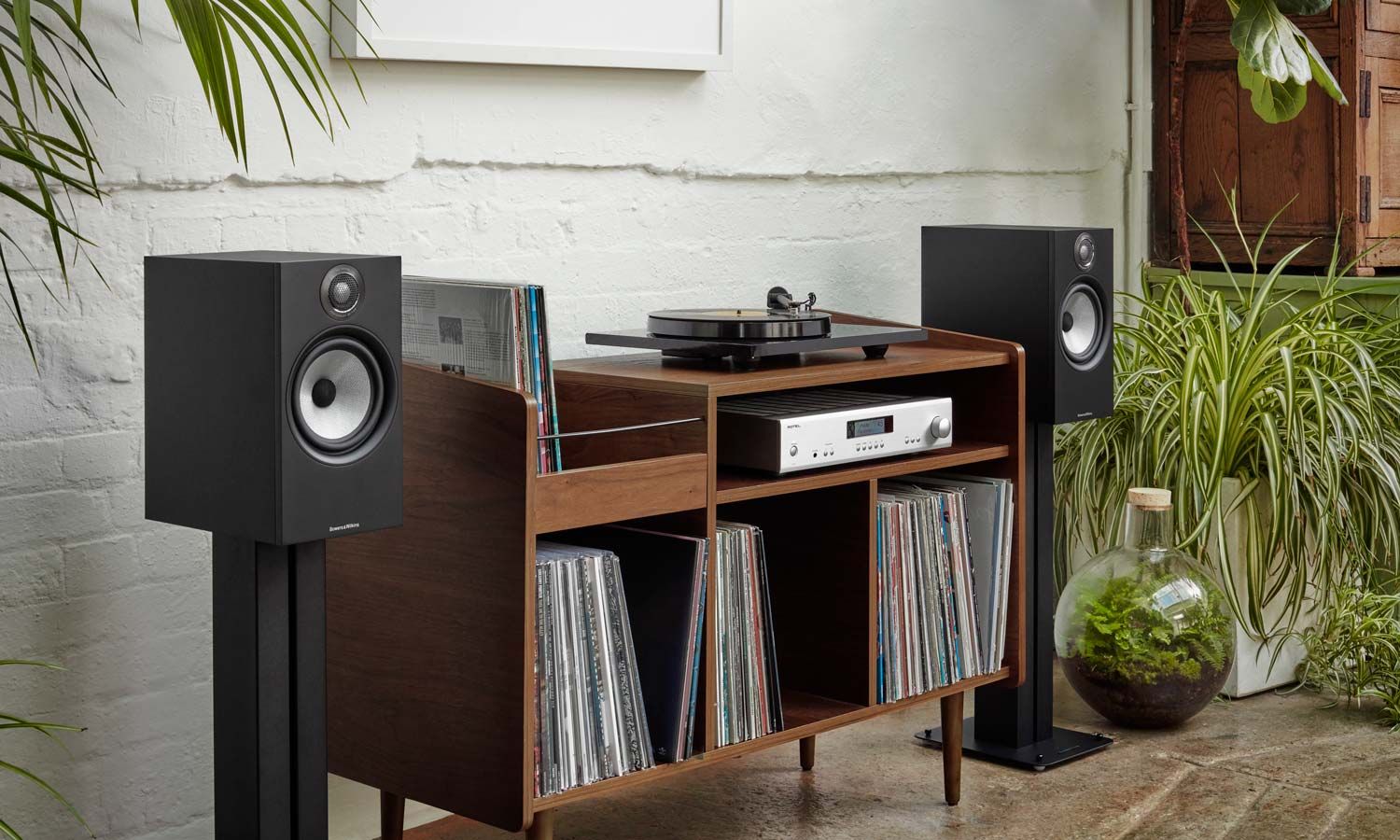 white keypad on white brick wall lutron