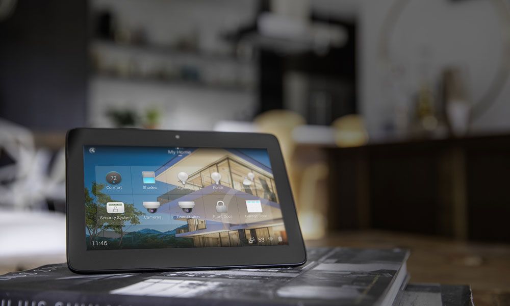 control4 touchpanel on stack of books